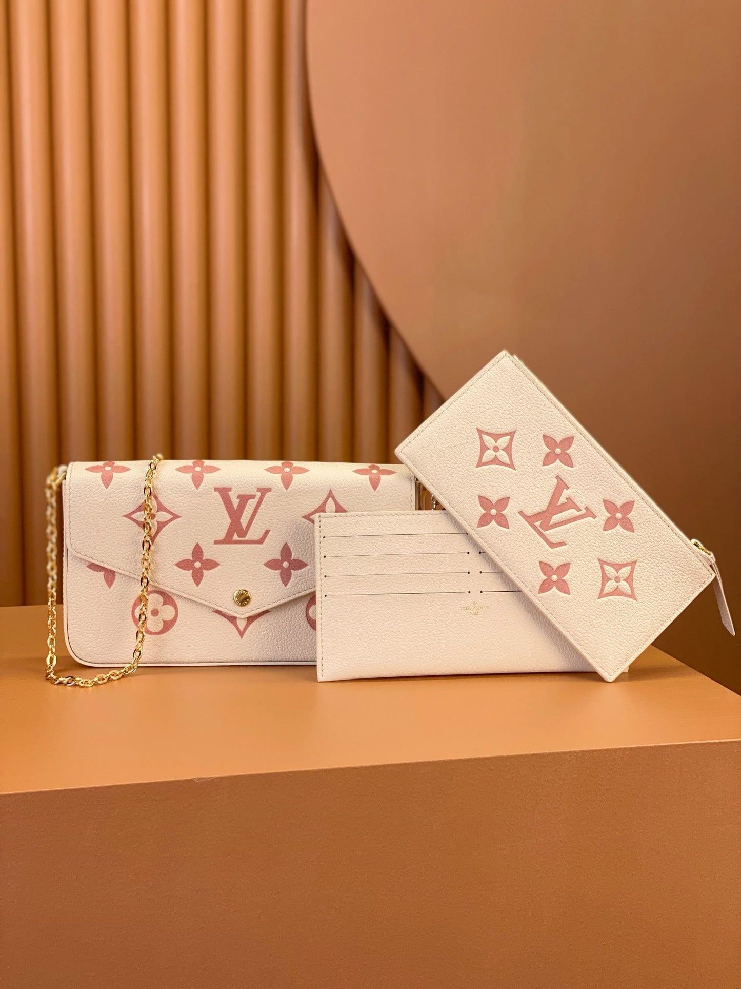 0528 Monogram Empreinte Félicie Pochette