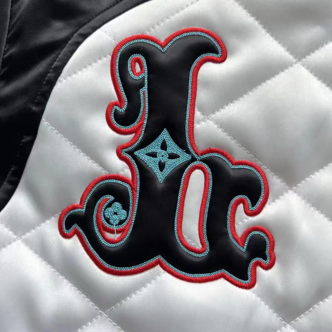 Black and white patchwork embroidered baseball jacket