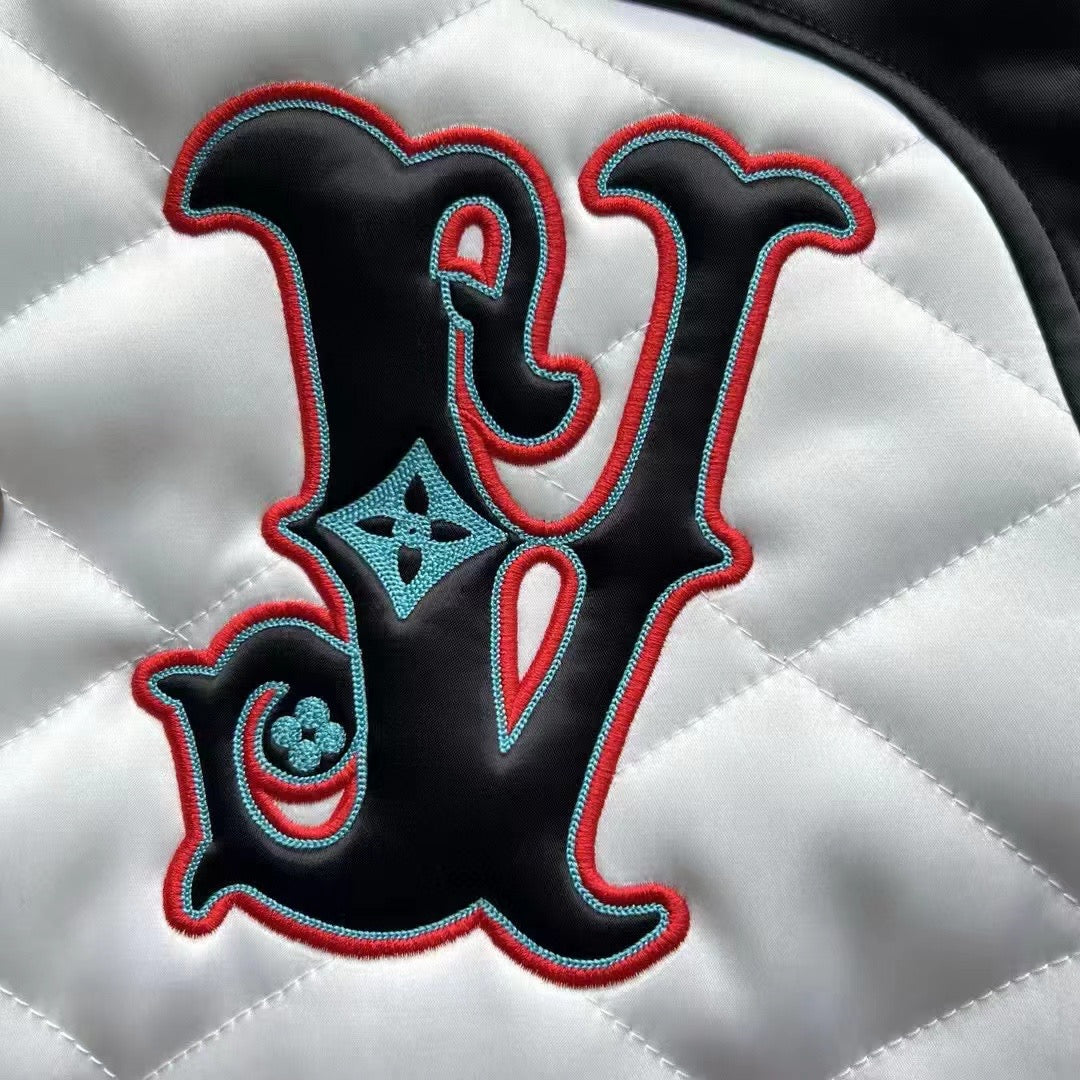 Black and white patchwork embroidered baseball jacket